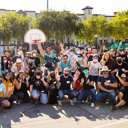 A picture of Riot employees on a basketball court